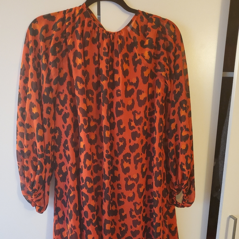 Eva Mendes red animal print flowy dress